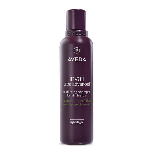 Aveda invati ultra advanced exfoliating shampoo bottle on a white background
